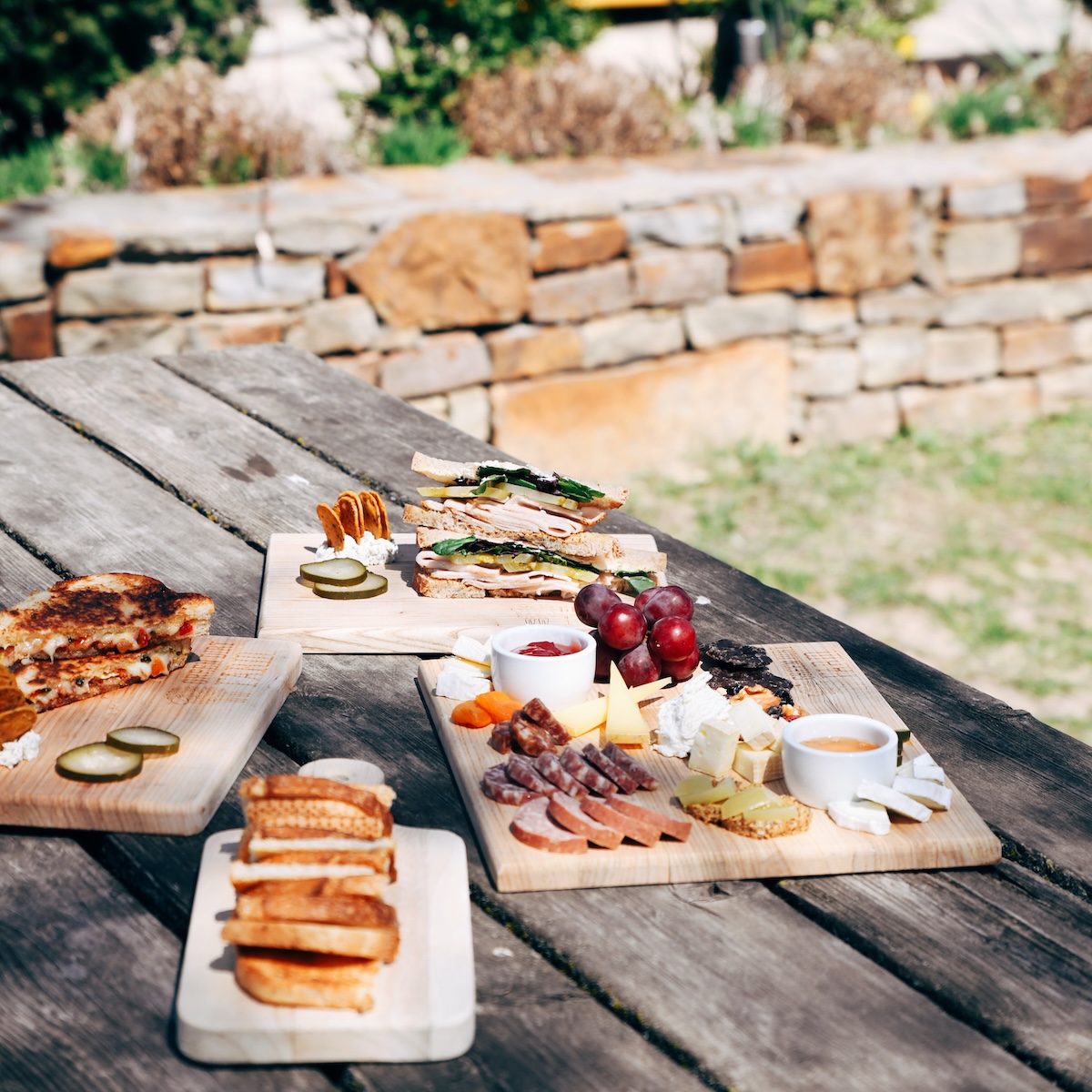 Creamery menu items spread out on a picnic table