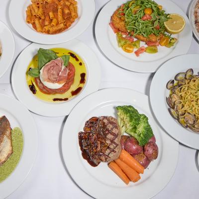 Various dishes served on the table, top view.