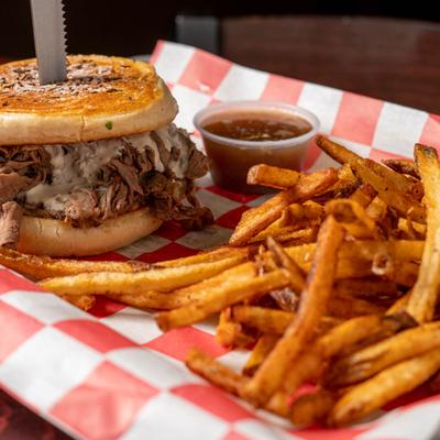 Roasted beef sandwich and fries.