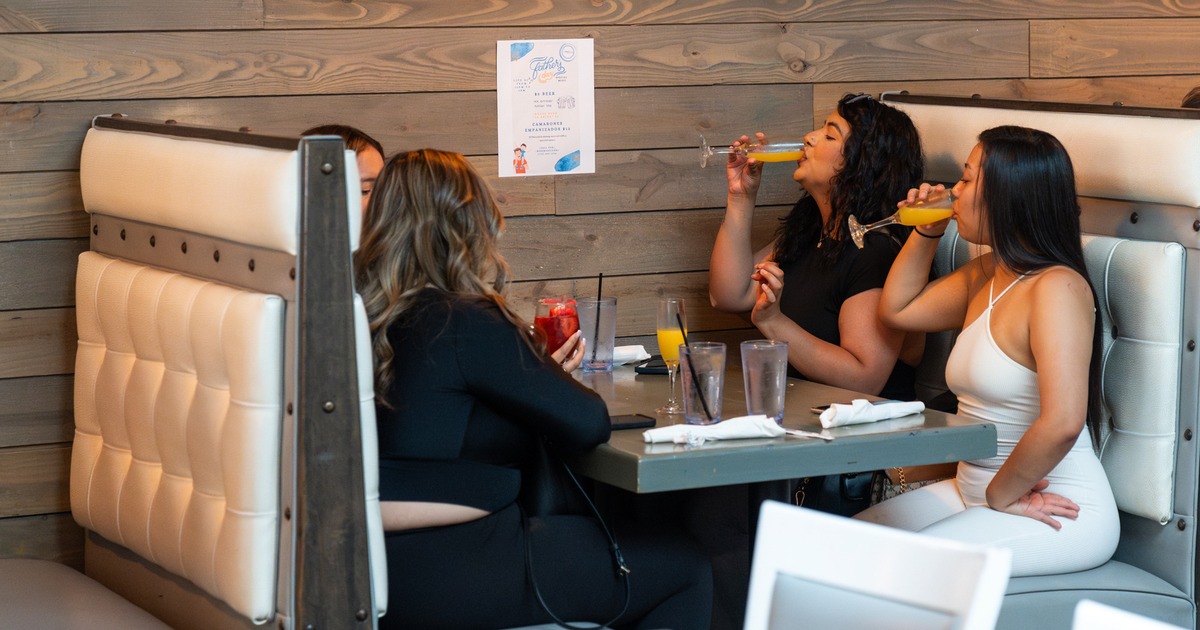 Booths, people drinking