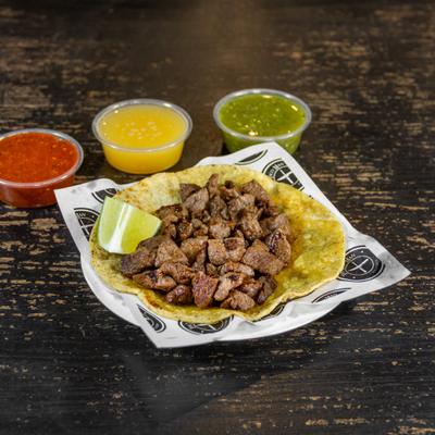 Steak taco and salsa sauces.