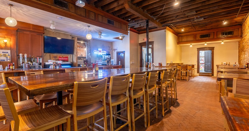 Interior, seating area with a long table