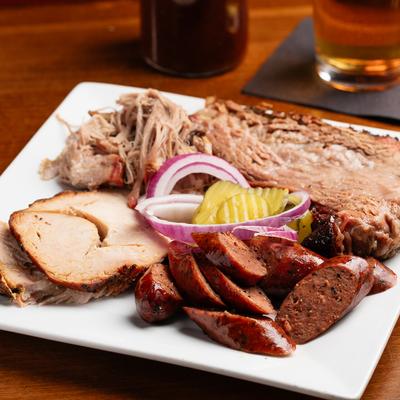 Smoked brisket, pulled pork, sausage, and turkey.