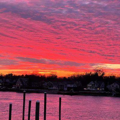 Sunsets at Trafford can turn the sky and river  bright red and purple
