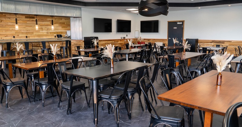 Interior, seating area with tables and chairs