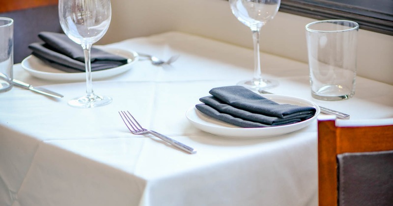 Interior, table set for guests,  dining area