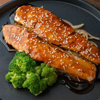 Salmon teriyaki with steamed broccoli.