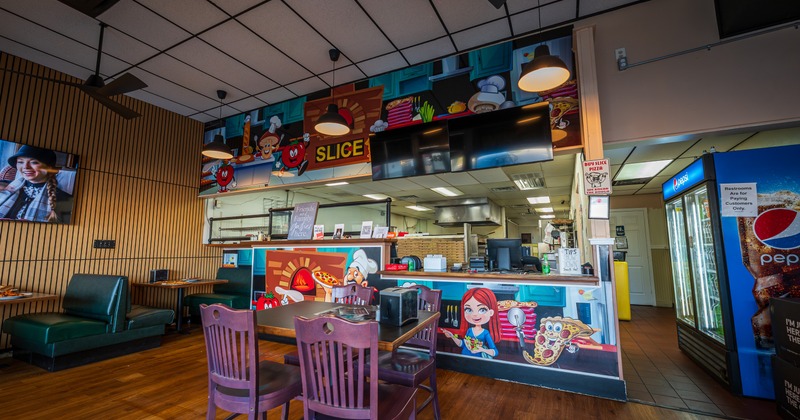 Dining area with booths and tables and chairs