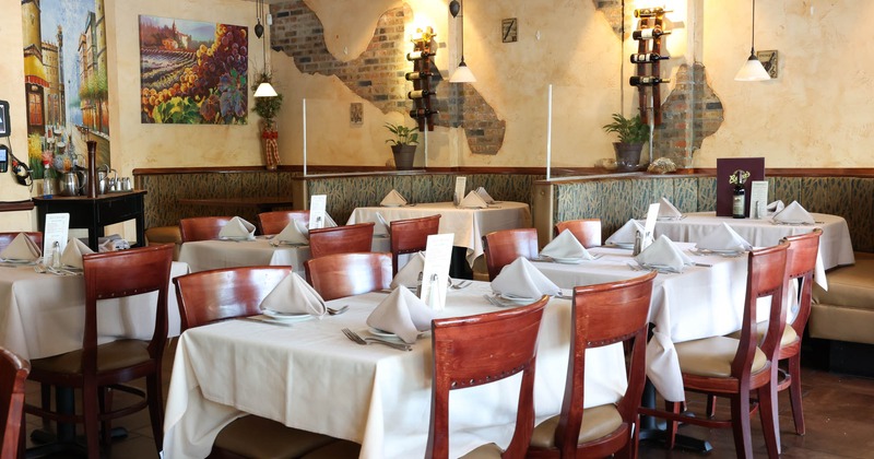 Interior, tables and chairs ready for guests