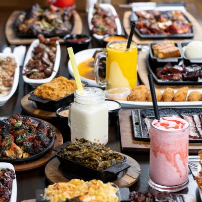Assortiment of dishes served on the table with drinks.