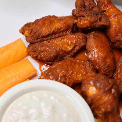 Nicky’s Chicken Wings served with ranch,  carrots & celery.