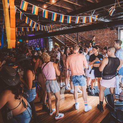 Interior, people enjoying their time in the bar area