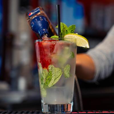 Cranberry Mojito glass, cocktail preparation.