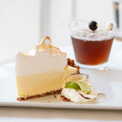 Keylime Pie, and a cocktail in the background