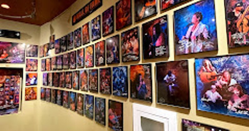 Pictures of famous musicians on wall