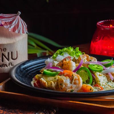 Chicken & shrimp, over sushi rice with pineapple, peppers and red onion.