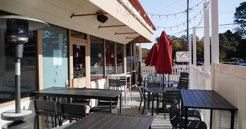 Exterior, patio, tables, chairs, parasols