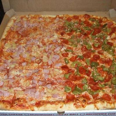 Party Pizza with half pepperoni and sausage and half ham and pineapple.