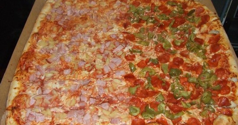 Party Pizza with half pepperoni and sausage and half ham and pineapple