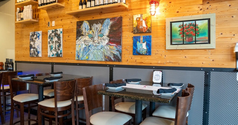 Interior, dining tables with chairs ready for guests