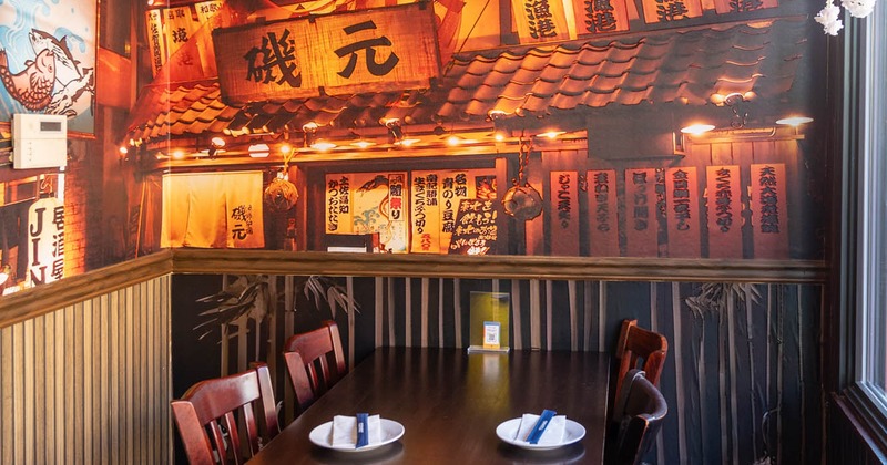 Interior, table and chairs next to the wall