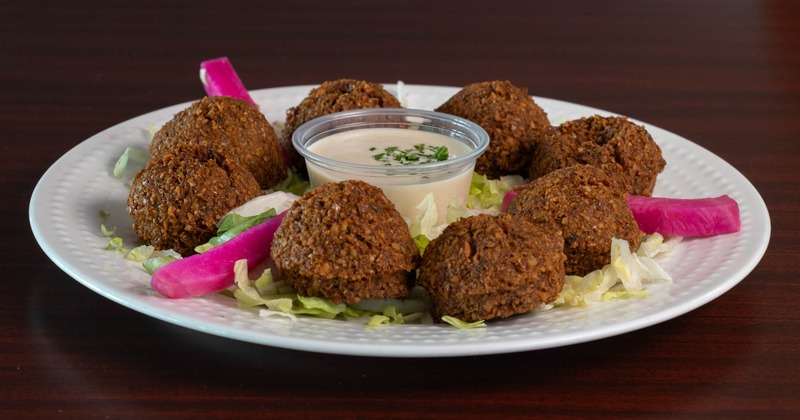 Falafel served with a sauce