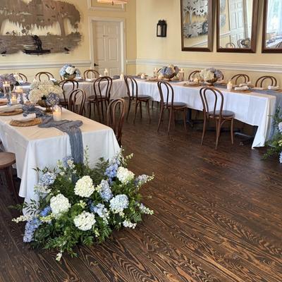 Tables with floral decorations.