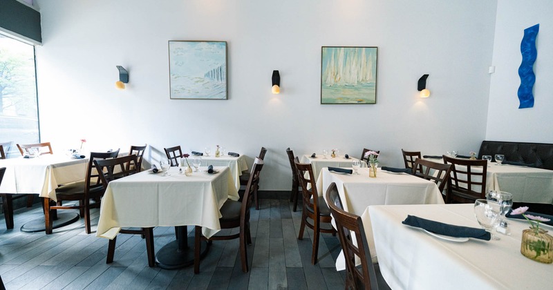 Interior, dining area, tables with chairs, shop window, tile flooring