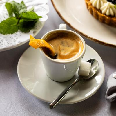 Espresso in a small cup, front view.