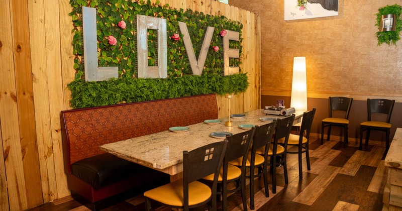 Dining area with tables and natural wood decor