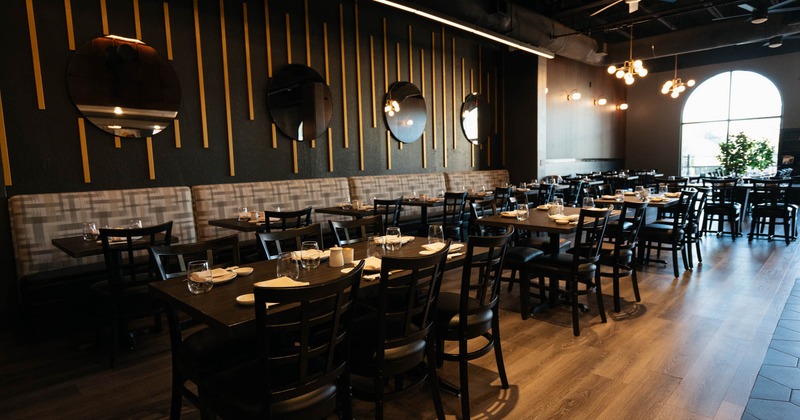 Interior, wide view of dining area, tables and chairs