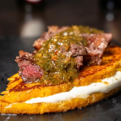 Served steak cachapa.