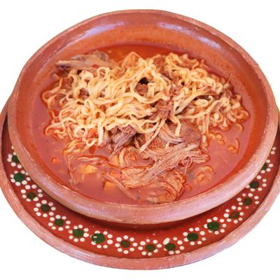 Birria Ramen served in a traditional clay bowl.