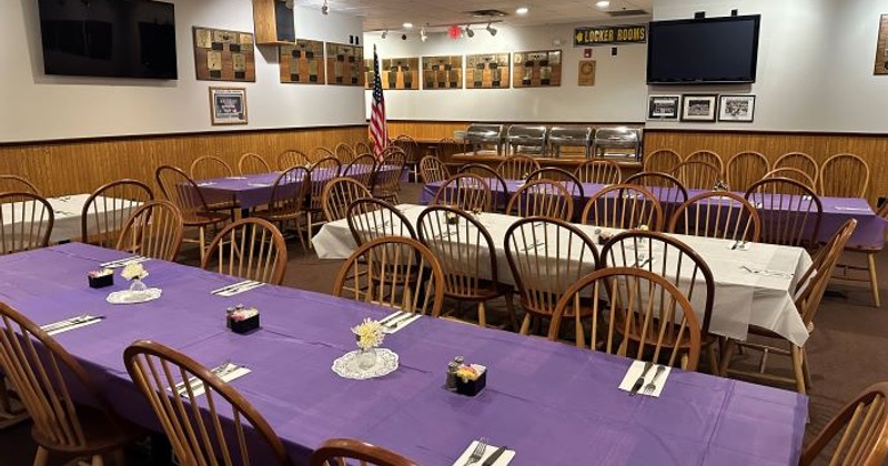 Interior, tables and chairs, and the bar