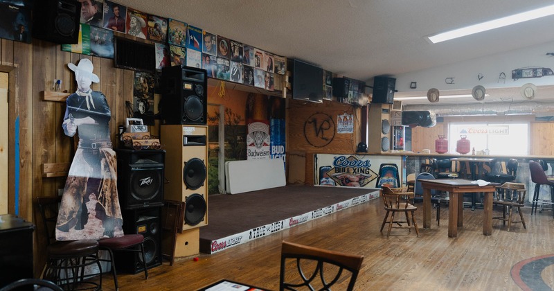 Interior, table and chairs near stage