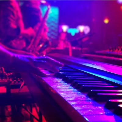 Person playing keyboards.