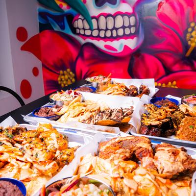 Various platters of food served on the table.