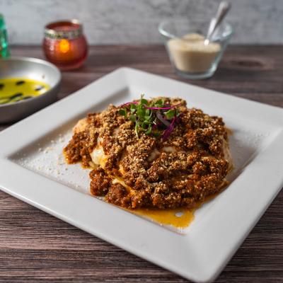 House-made pasta shells in meat sauce.
