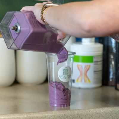Verry Berry shake being poured into a cup.