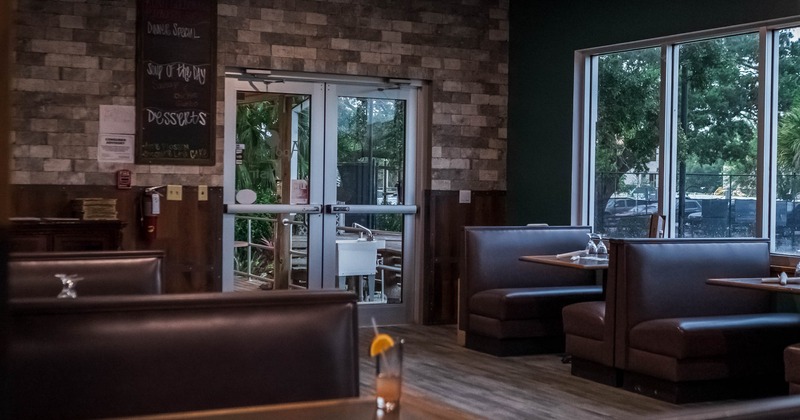 Interior, dining area with boots and tables