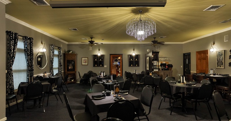 Interior, tables and chairs in dining area