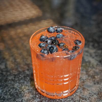 Orange cocktail, with blueberries