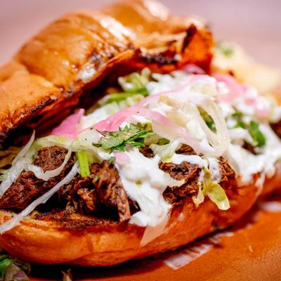 Birria torta sandwich, close up.