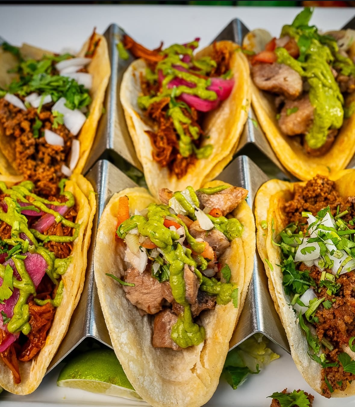 Assorted tacos with toppings