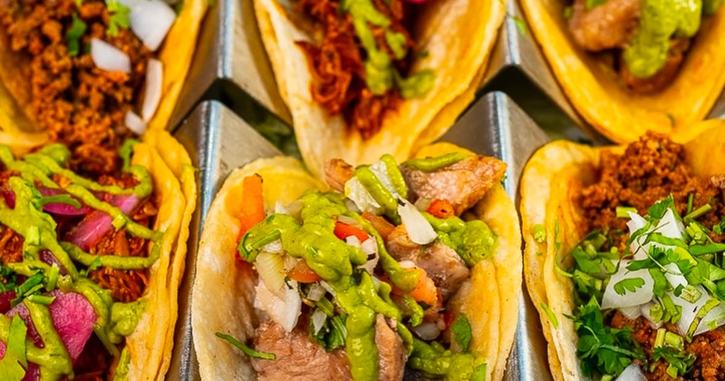 Assorted tacos with toppings