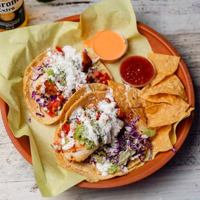 Fish tacos with chips and salsa