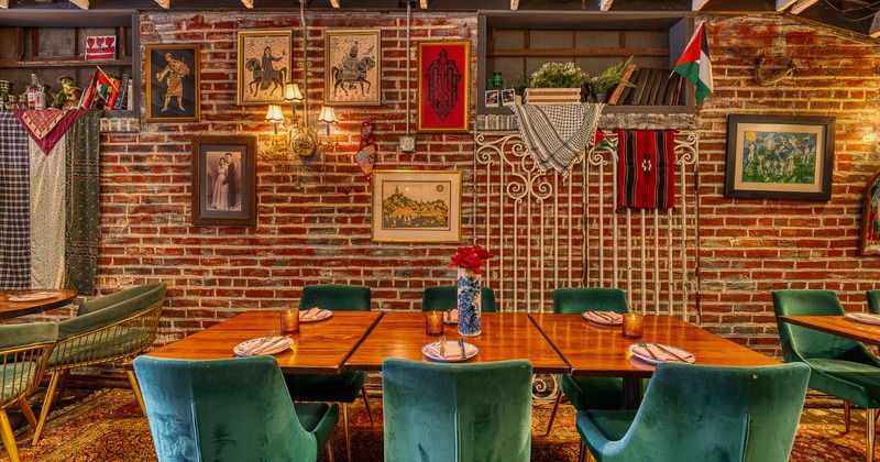 Cozy and stylish interior dining area with tables set for guests