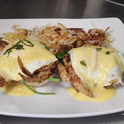 Soft-shell Crab Bennedict served with basted eggs, crispy hash browns, and mouth-watering Hollandaise sauce..