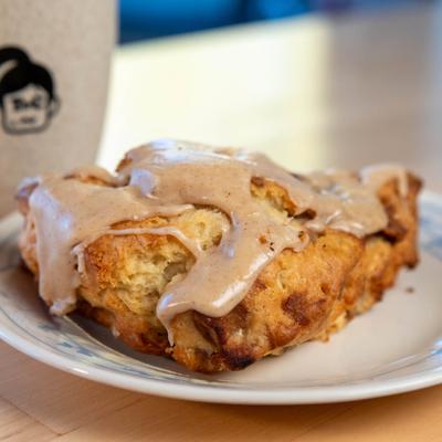 A scone with maple chai glaze.