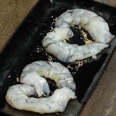 Raw Tiger shrimp served on a plate.